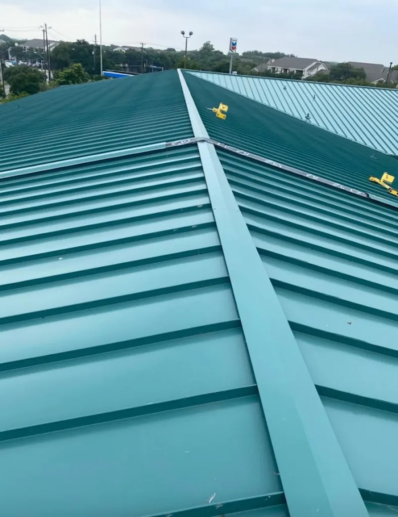 Green commercial metal roof ridge and valley for Metal Roof Repair in Maquoketa