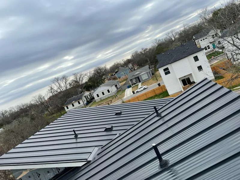 Standing seam metal roof panels with vents for Skylight Repair in Maquoketa